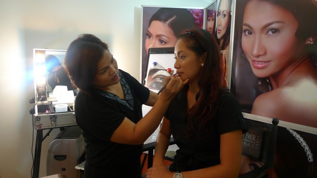 Anne demonstrating some makeup techniques
