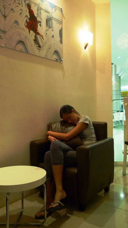 Feeling sleepy at Coffee Dream after a long airplane and bus trip