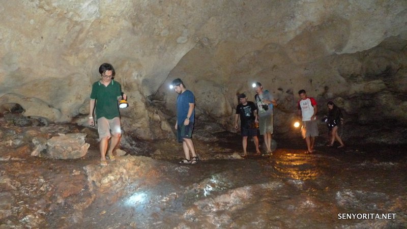 Travel bloggers spelunking at Aglipay Caves (when they were still "clean")