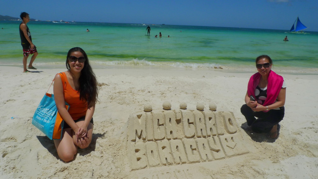 The kids created this sand sculpture with my name and Carlo's name on it :D 