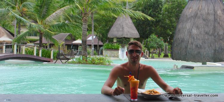 Tim of Universal Traveller enjoys his lunch in Two Seasons' pool area. Who wouldn't say yes to that treat? :D